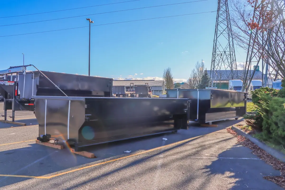 Roll-off dumpster ready for waste disposal at job site for 30 Yard Dumpster Rental in Waller